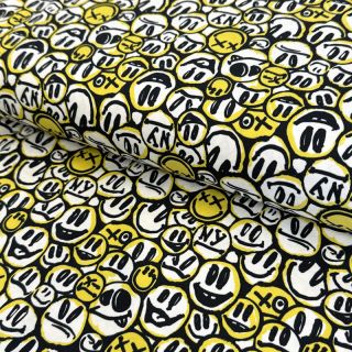 Tricot Pulling faces yellow digital print